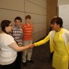 US Secretary of Commerce Penny Pritzker greets students at the M.Lab21 announcement.